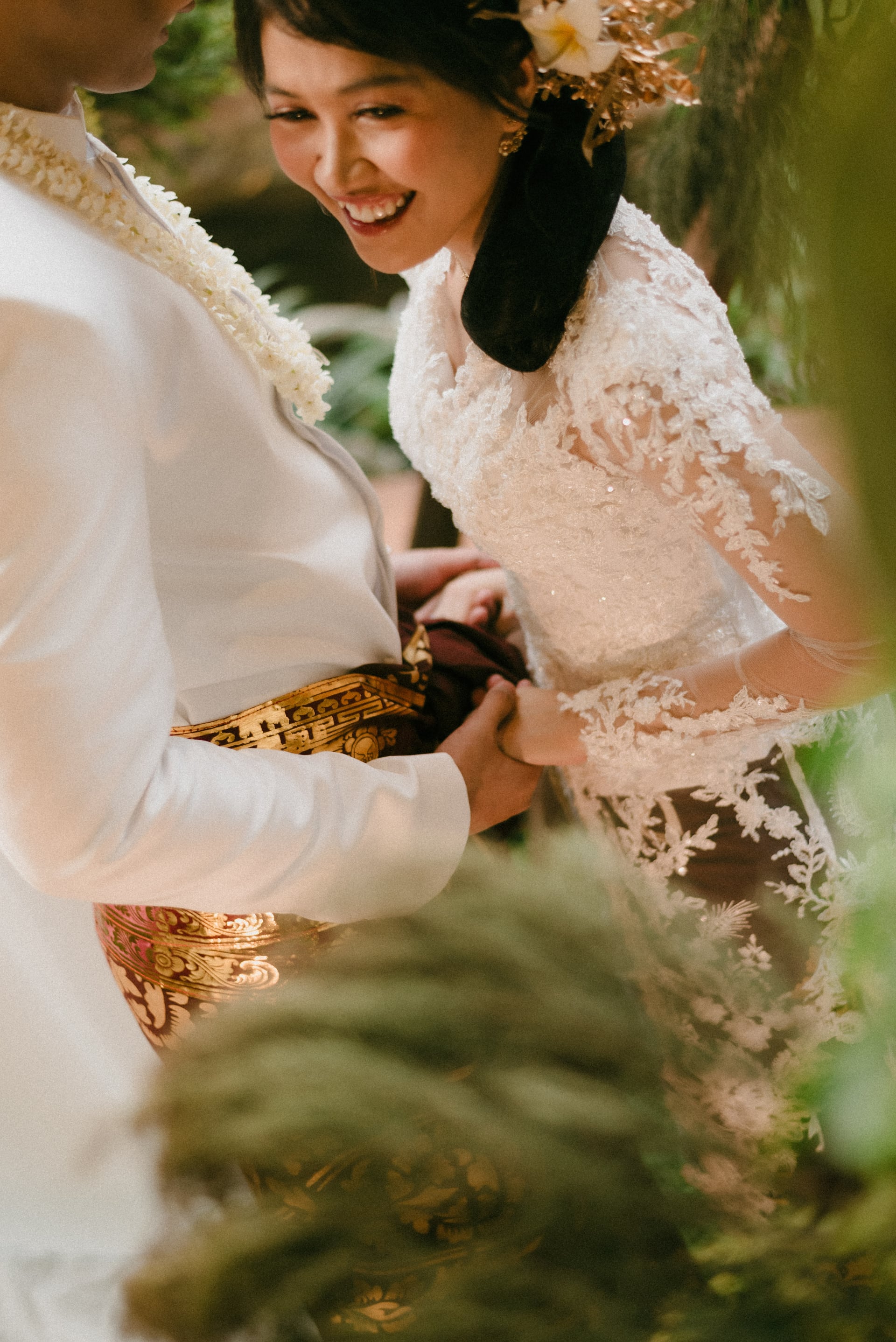 A couple's hands joined during the ceremony.